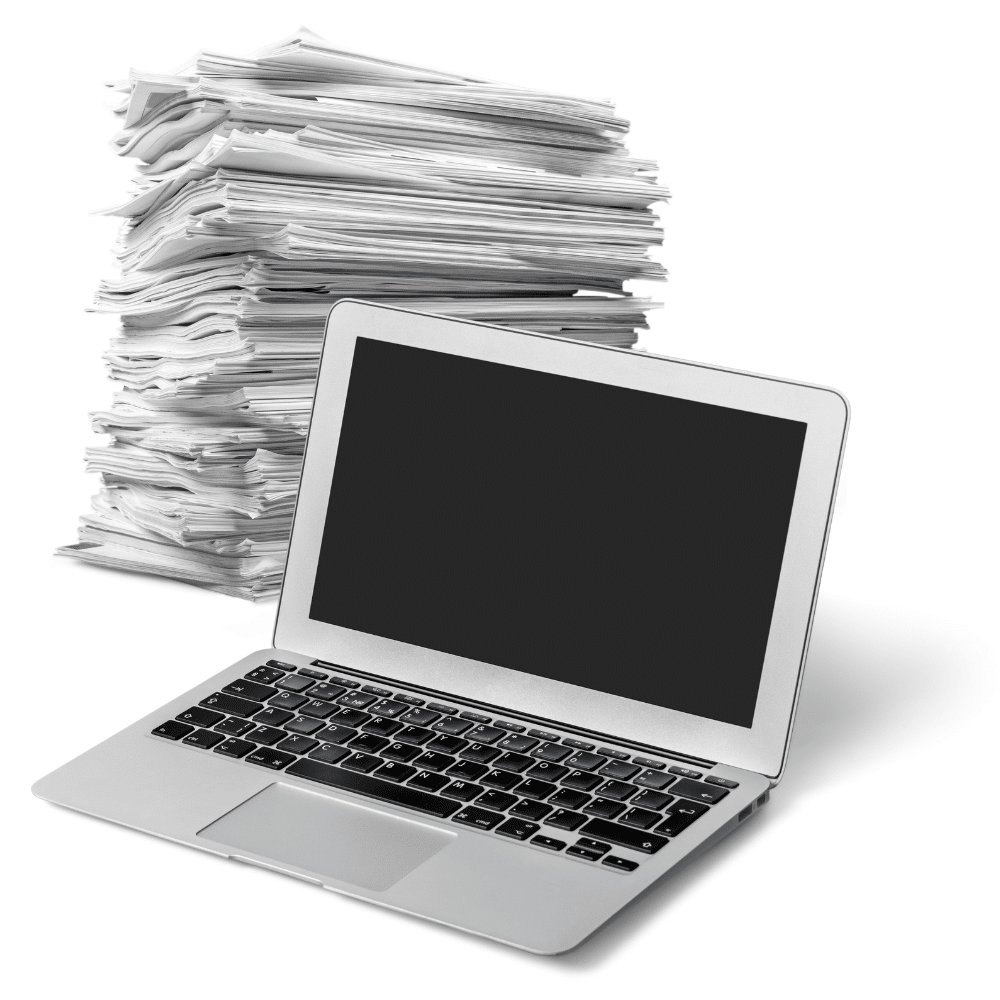 computer with paper stack.